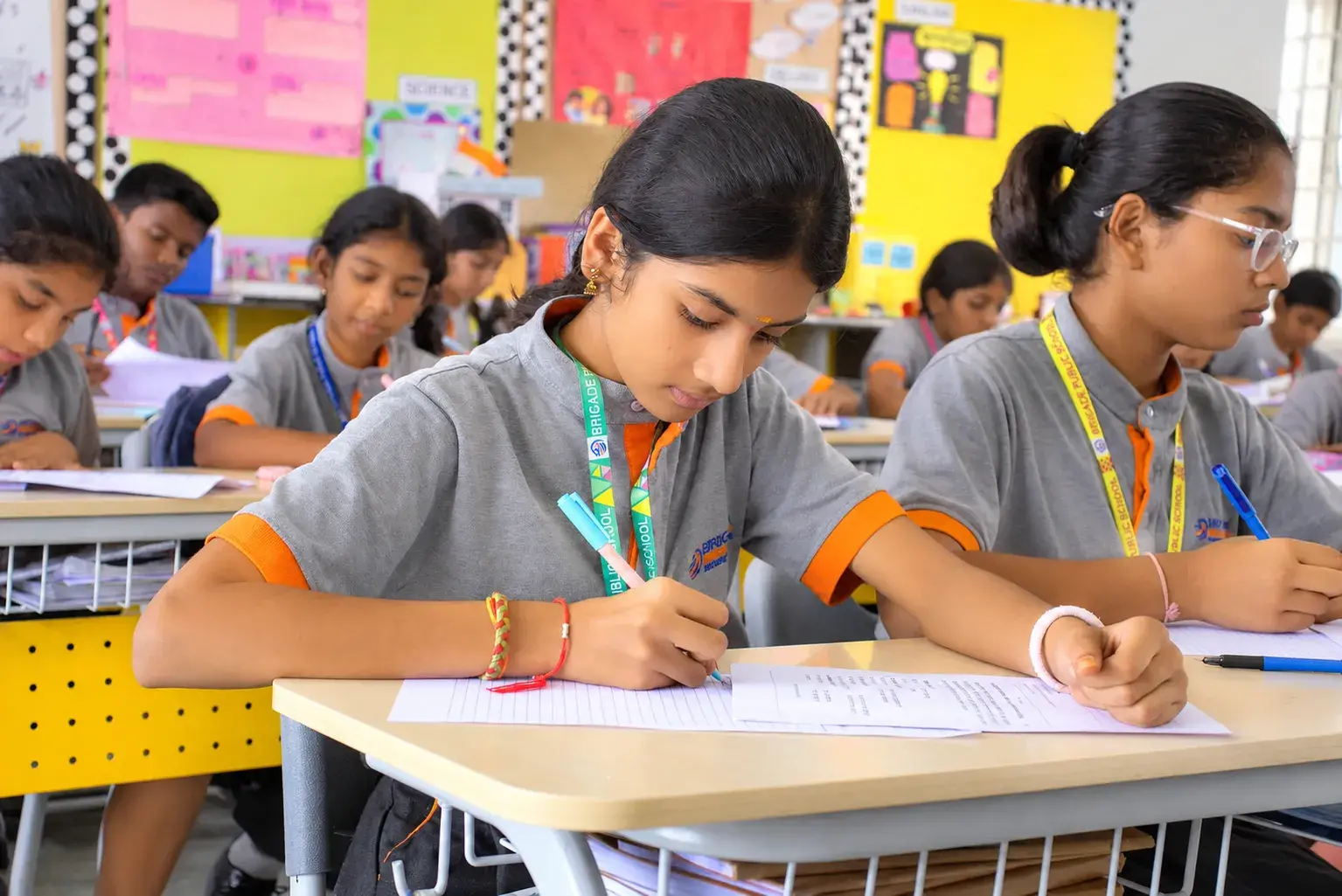Student writing in class at Brigade Public School, Gurramguda campus